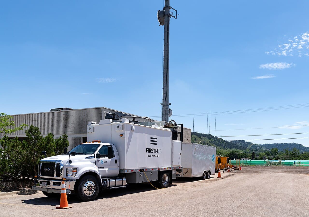 An AT&T FirstNet deployable cell tower truck with its mast raised in Rapid City, South Dakota, in July 2022.